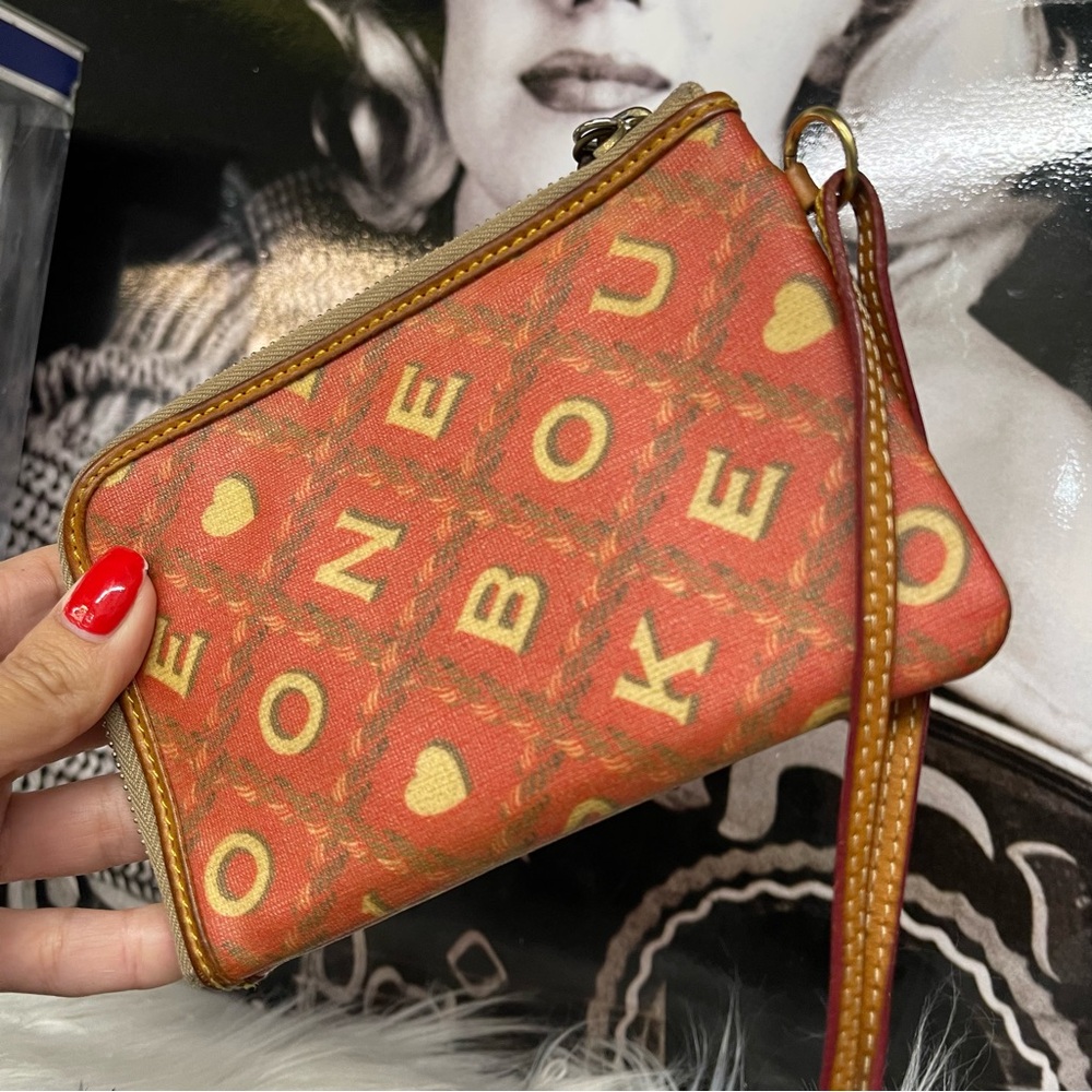 Dooney and Bourke Vintage Pink Wristlet Zip Clutch Wallet